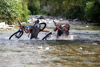 Anton Cooper and Dirk Peters crossing the last river side by side with 200m to go.