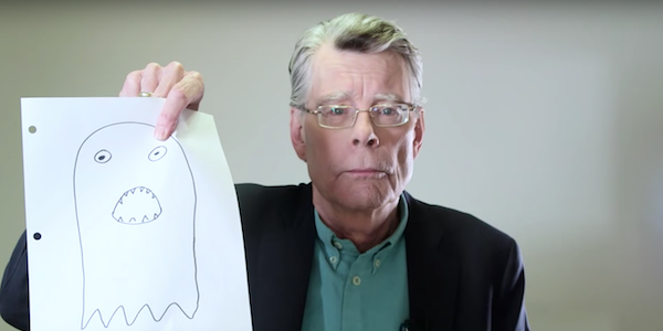 stephen king holding drawing of ghost