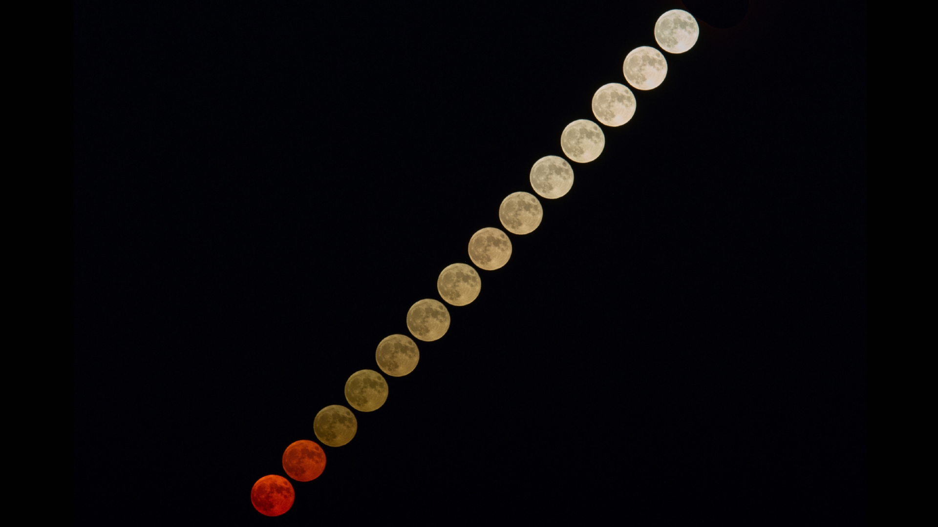 The image is a composition of 14 single interval shots and shows moon rising direction and brightness changing) Full harvest moon is seen in Calascio (L'Aquila, Abruzzo), Italy, on September 29, 2023.