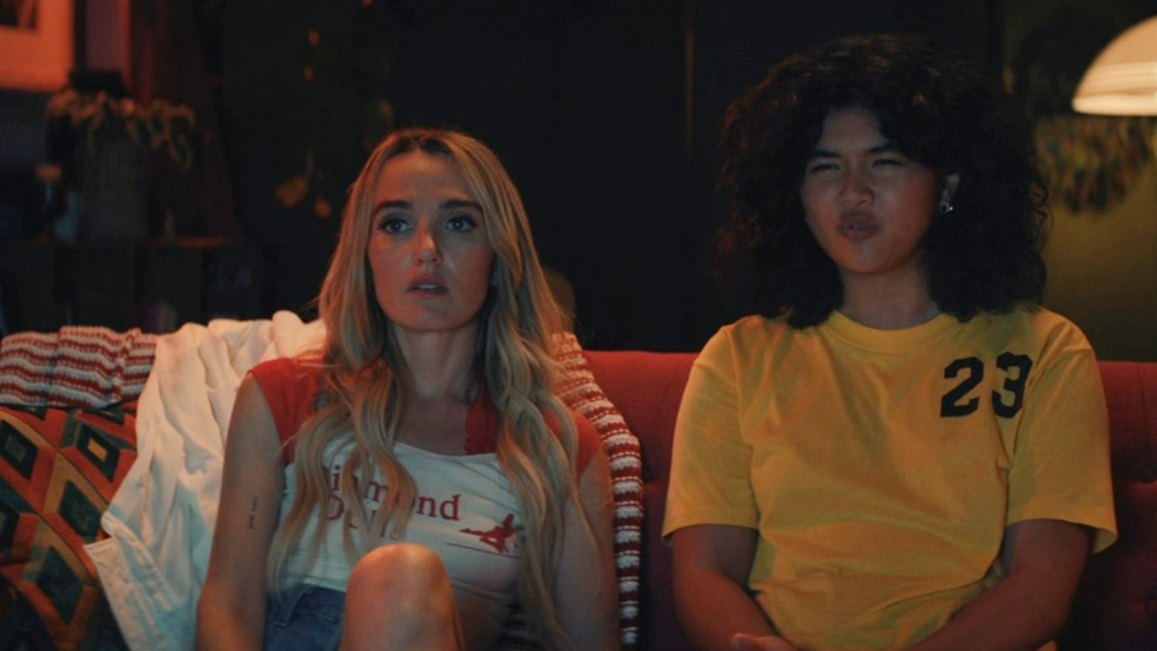Chloe Fineman and Sam Morelos watching TV in Summer of 69.