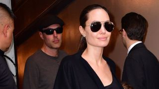 Angelina Jolie and her brother, James Haven wearing sunglasses