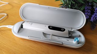Oral-B iO Series 9 electric toothbrush in charging case