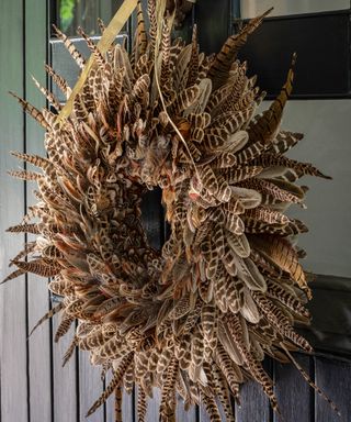 Thanksgiving wreath ideas with wreath made from pheasant feathers