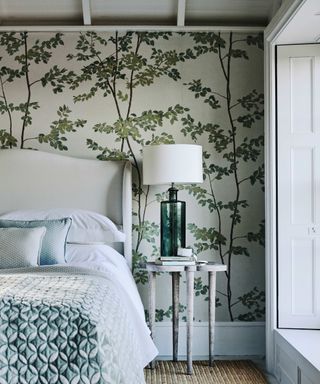 Bedroom with green floral wallpaper