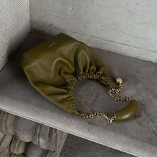 olive green Loewe squeeze bag with metal handle 