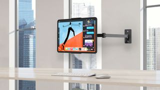 Bewiser wall mount iPad on a wall mount above a desk