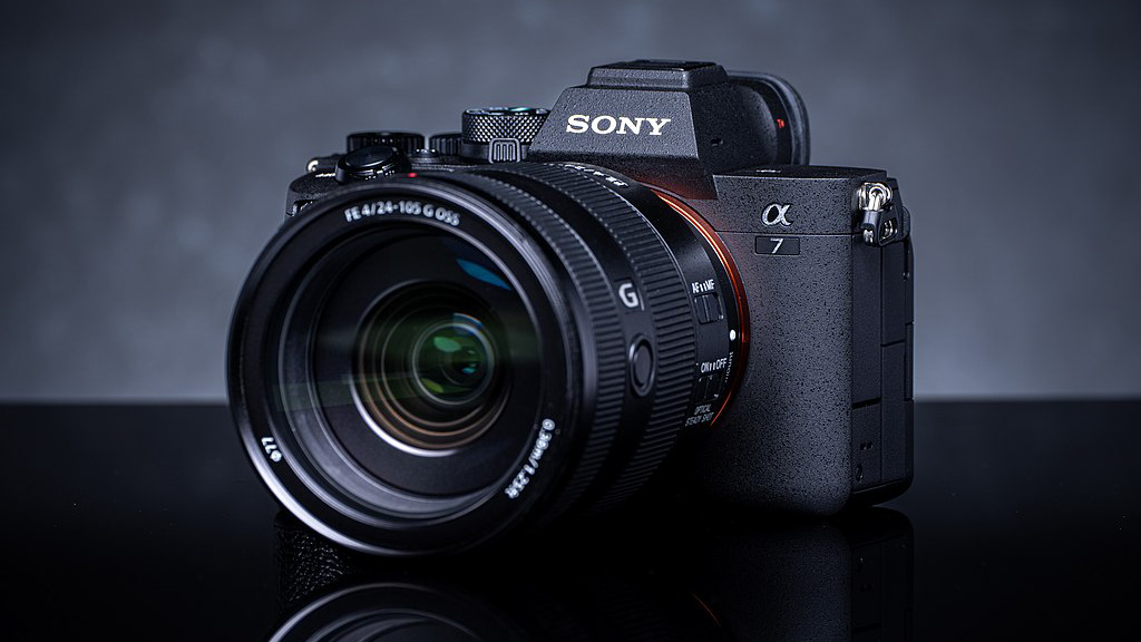 A black Sony camera with a lens attached.