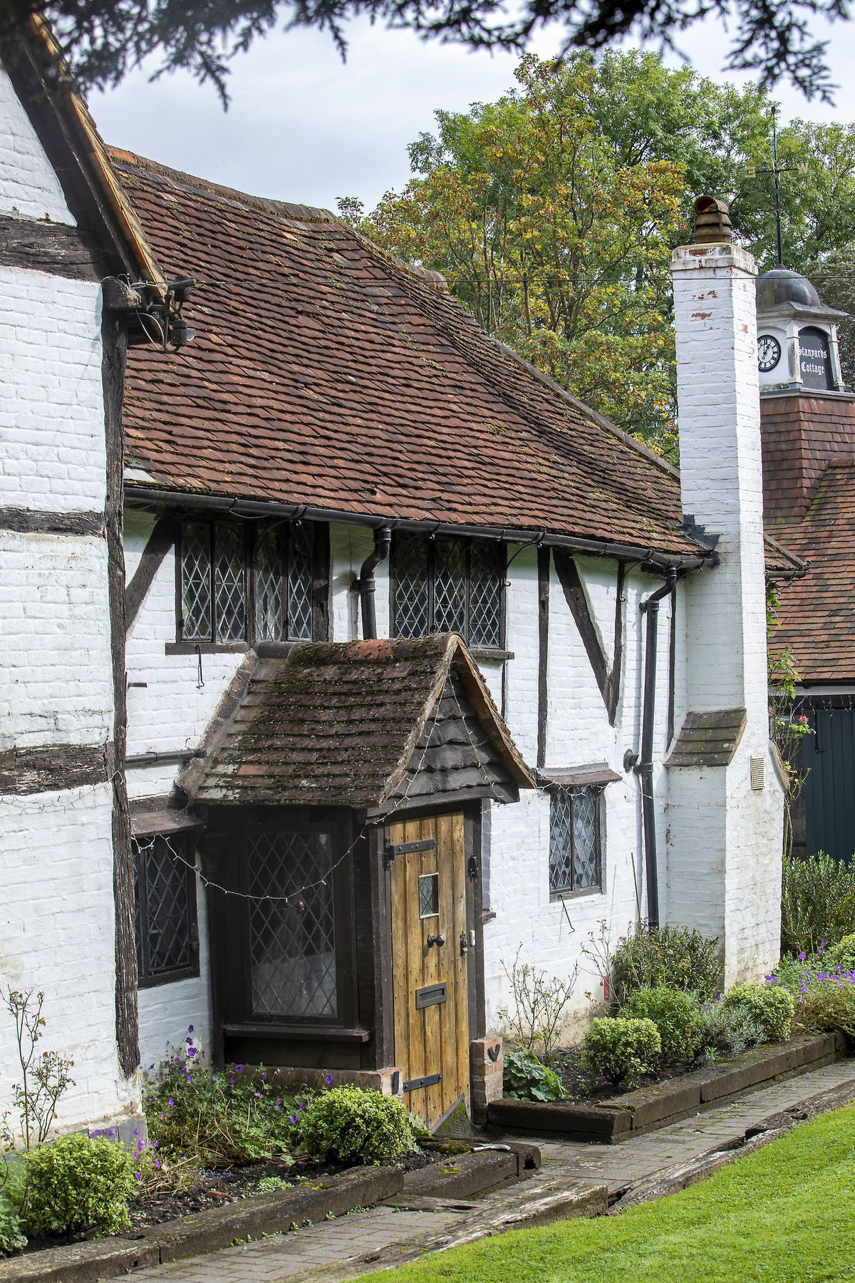 listed timber cottage front door