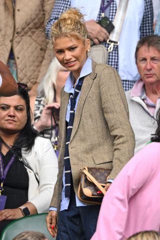 LONDON, ENGLAND - JULY 13: Zendaya, wearing Ralph Lauren, attends day thirteen of the Wimbledon Tennis Championships at the All England Lawn Tennis and Croquet Club on July 13, 2024 in London, England.