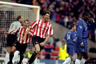 Niall Quinn celebrates with Kevin Phillips after scoring for Sunderland against Chelsea, 1999