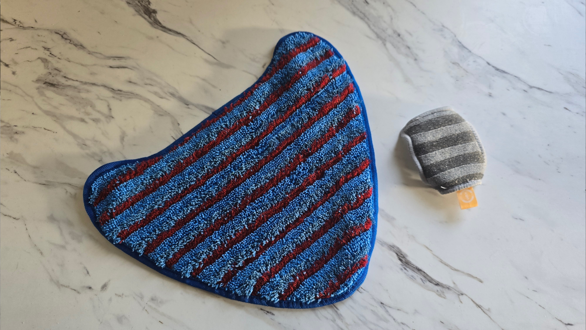 Vax cleaning pads before and after washing