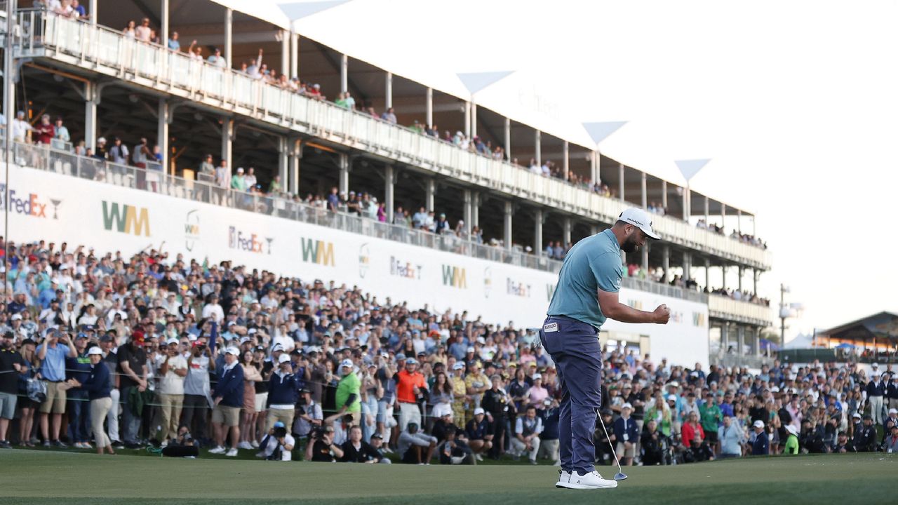 Jon Rahm celebrates at the 2023 WM Phoenix Open