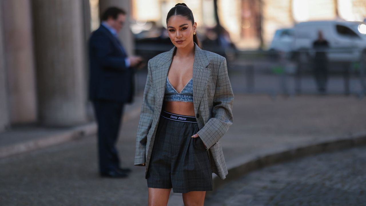  Vanessa Hudgens in a blazer short suit with a denim crop top 