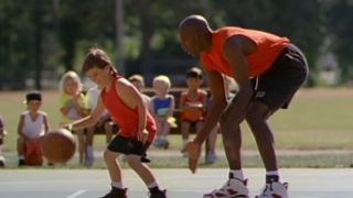 Michael Jordan plays defense against a little kid in a Gatorade commercial.