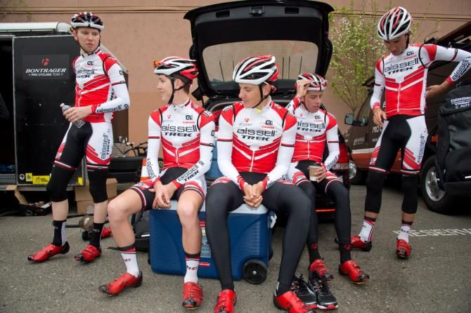 Riders relax on whatever is handy before heading out on a 6 hour ride.