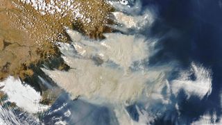 An image from the Moderate Resolution Imaging Spectroradiometer (MODIS) instrument on NASA's Aqua satellite, taken on Jan. 4, 2020, captured smoke plumes blanketing Australia's southeastern coast.