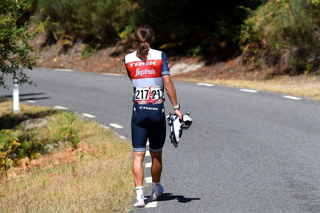 EL BARRACO SPAIN AUGUST 29 Kiel Reijnen of United States and Team Trek Segafredo abandons the race during the 76th Tour of Spain 2021 Stage 15 a 1975km km stage from Navalmoral de la Mata to El Barraco lavuelta LaVuelta21 on August 29 2021 in El Barraco Spain Photo by Tim de WaeleGetty Images