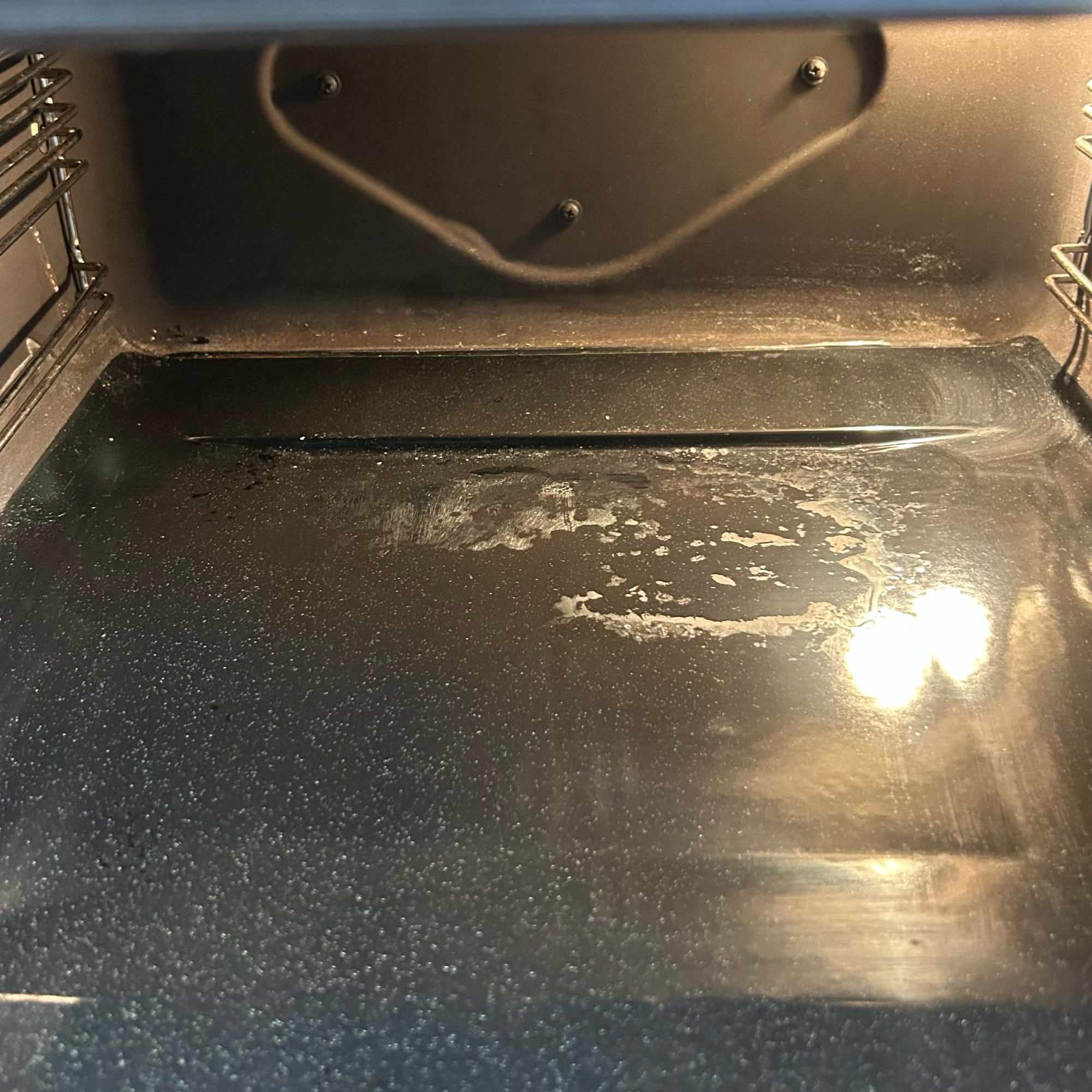 Clean oven base with a few white marks