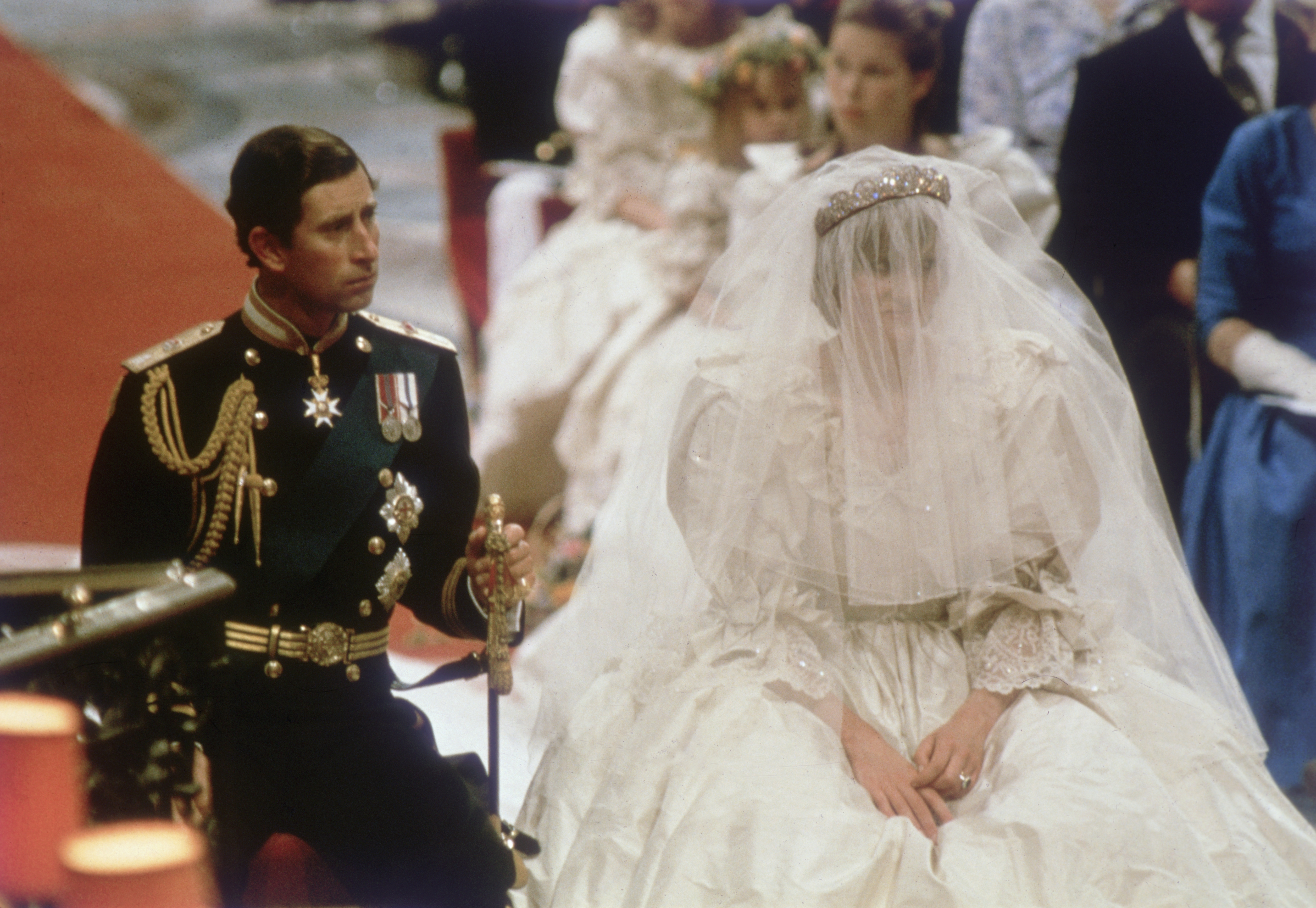 Prince Charles sitting next to Princess Diana on their wedding day