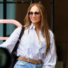 Jennifer Lopez wears baggy jeans with her favorite Dior D-Journey Bag.