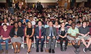   Dolan Middle School students with (centered L-R) Principal Charmaine Tourse, U.S. Senator Richard Blumenthal and Altice USA Chairman and CEO Dexter Goei  