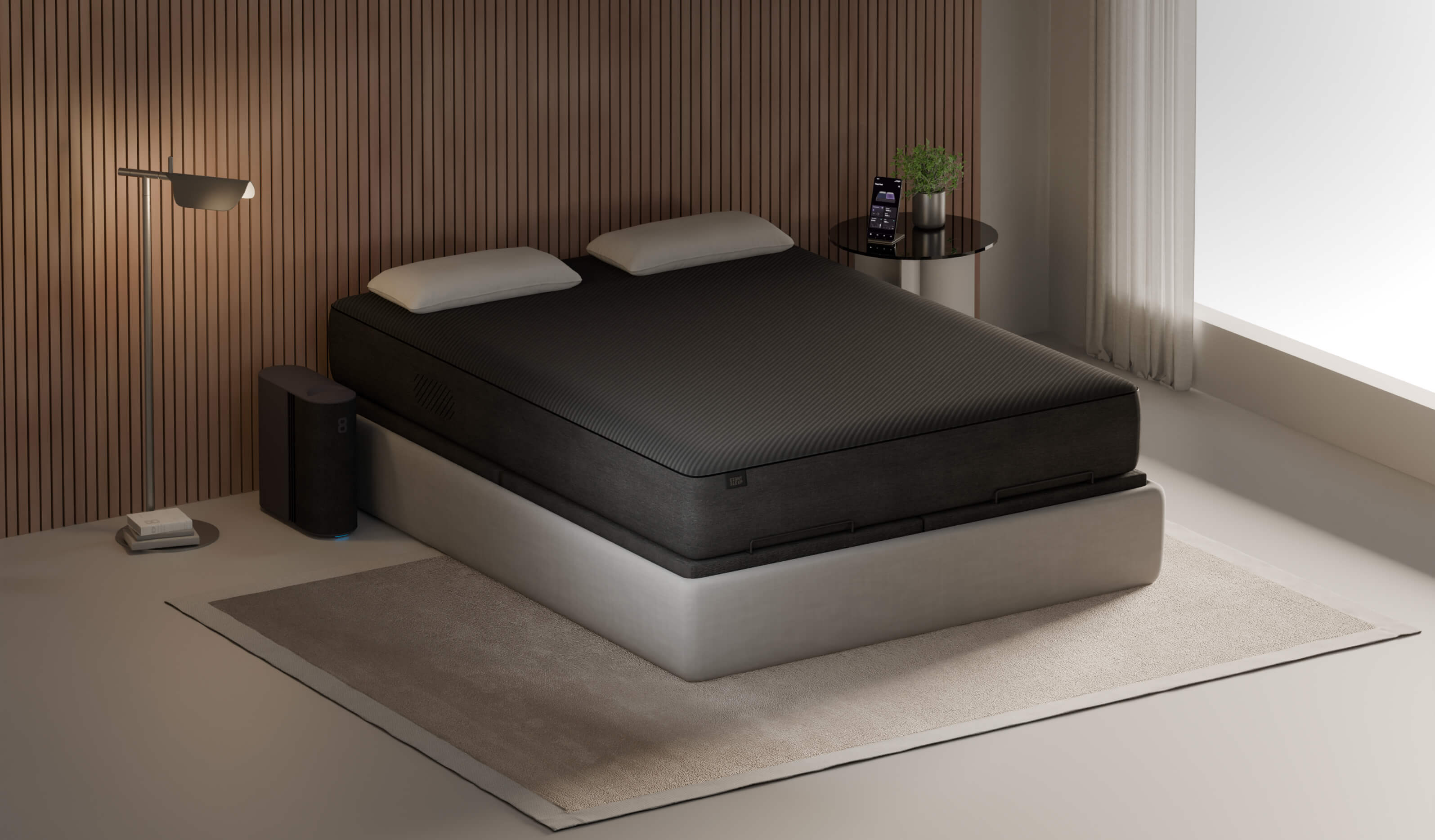An eight sleep pod alongside a double bed