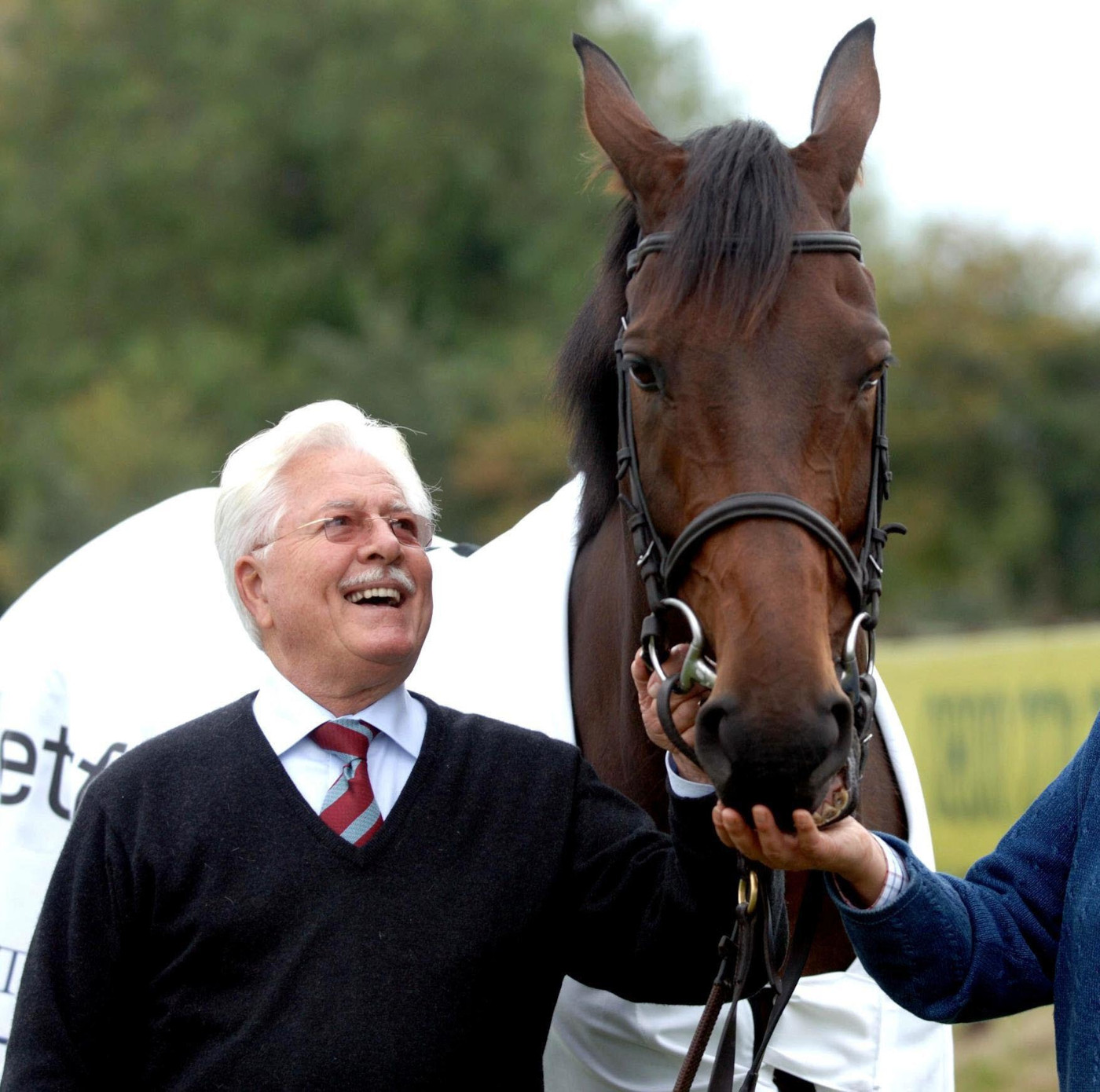 Racehorse owner Jim Lewis has died aged 88. Here he is pictured with the late Cheltenham Gold Cup winner Best Mate.