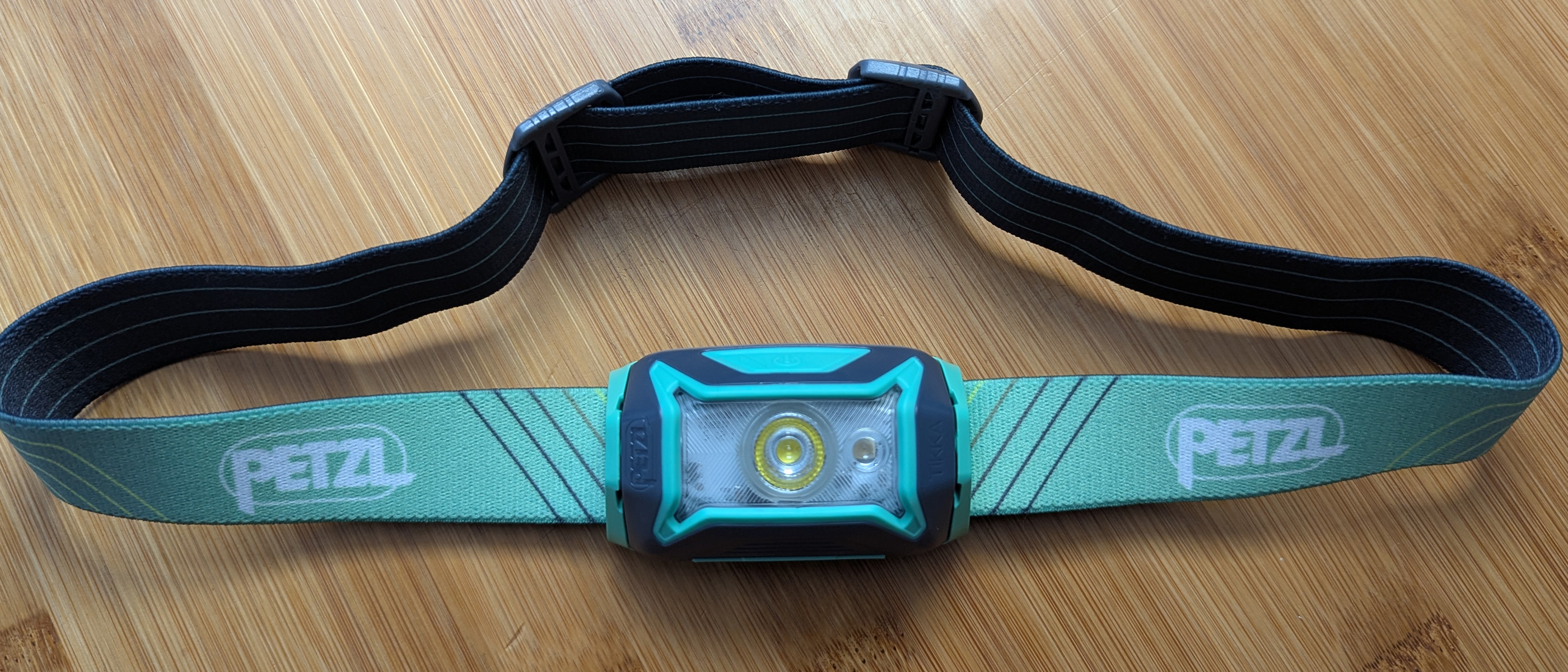 Petzl Tikka Core on a wooden table