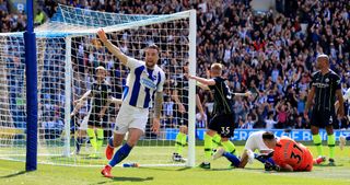 Shane Duffy celebrates after Glenn Murray puts Brighton in front
