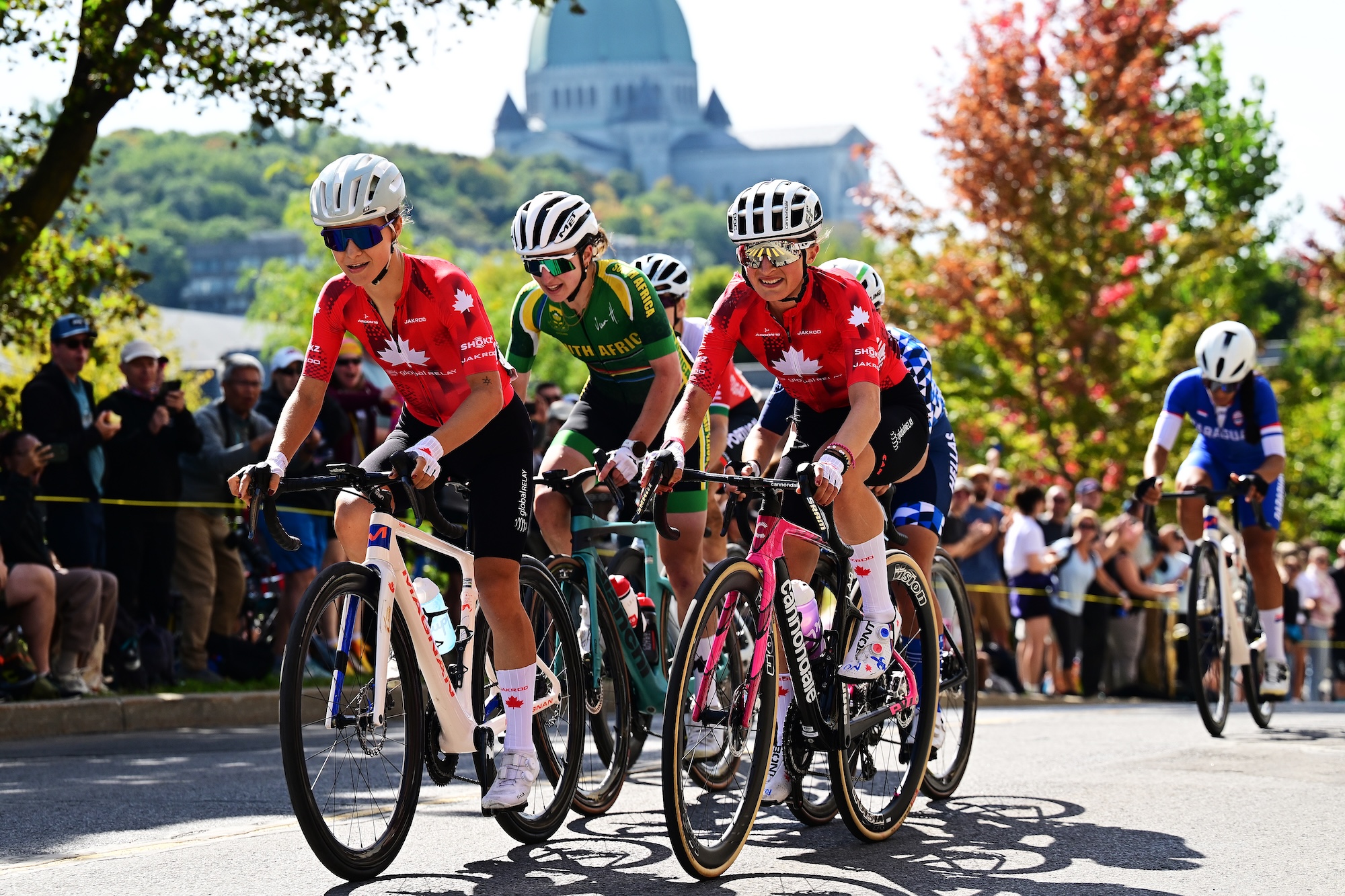 MONTREAL, QUEBEC - SEPTEMBER 26: (L-R) Adele Normand of Canada and Magdeleine Vallieres of Canada and Team Canada compete during the 99th UCI Road World Championships Montreal 2026 - Women Elite Road Race a 180.1km one day race from Brossard to Montreal on September 26, 2026 in Montreal, Quebec. (Photo by Tim de Waele/Getty Images)