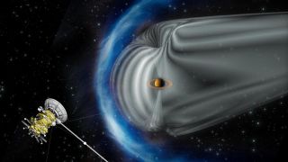 An artist's impression of Saturn's magnetosphere, with Cassini in the foreground. The blue region is the shock wave of the solar wind impacting the magnetosphere. The solar wind then causes the magnetosphere to stretch away in a tail-like shape.