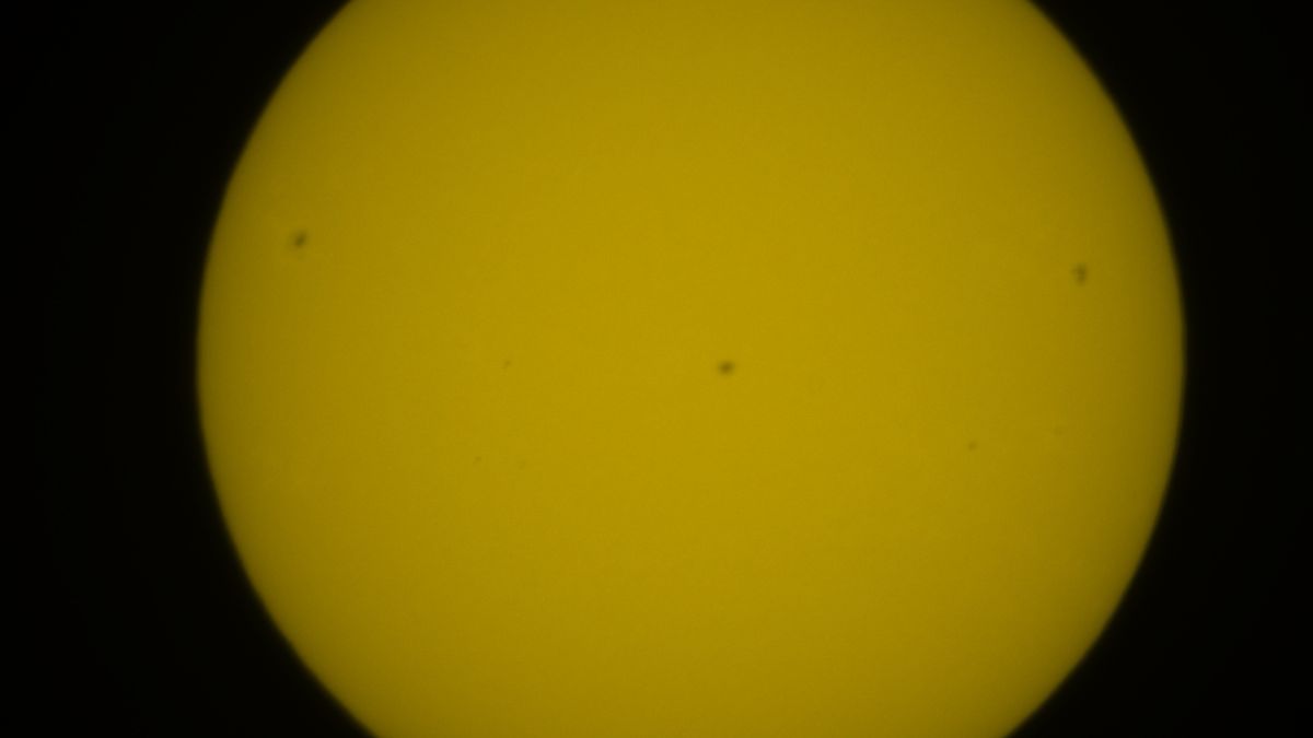 Part of the solar disk with sunspots in focus