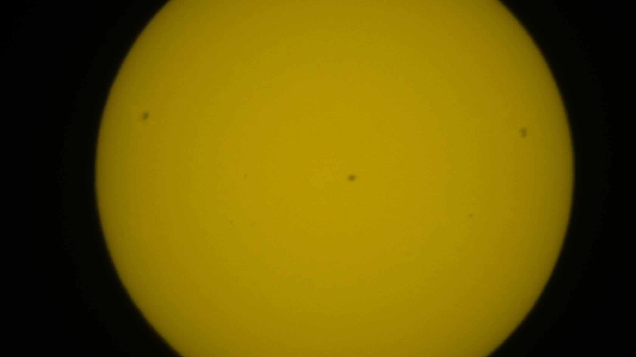 Part of the solar disk with sunspots in focus