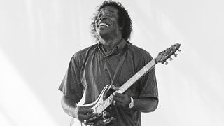 American blues musician Buddy Guy plays guitar on Central Park's SummerStage, New York, New York, June 30, 1990.