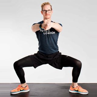 Rod Buchanan demonstrates the wide legs exercise