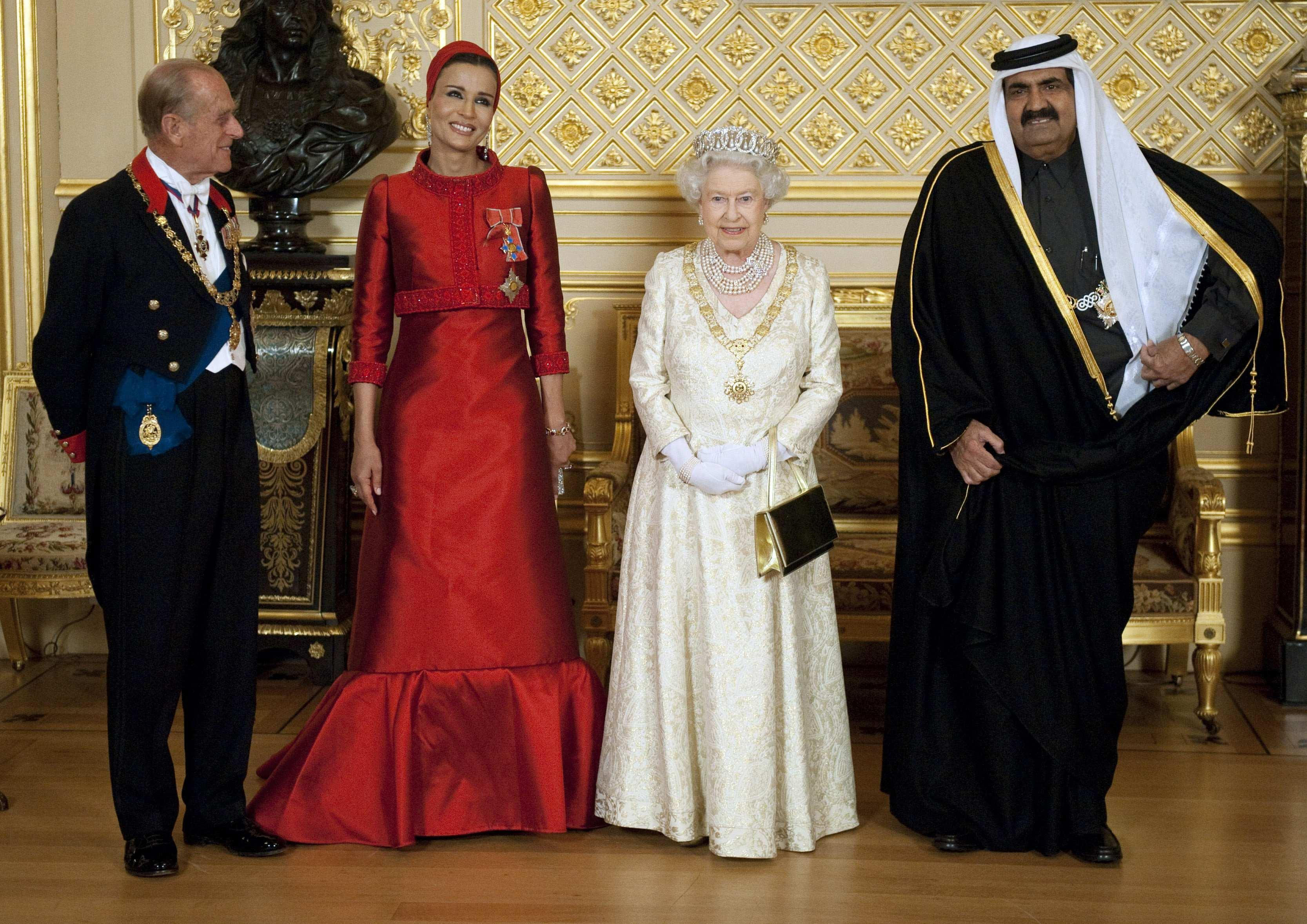 Queen Elizabeth and the Duke of Edinburgh with Qatar's Emir Sheikh Hamad bin Khalifa al-Thani and his wife Sheikha Mozah bint Nasser Al Missned