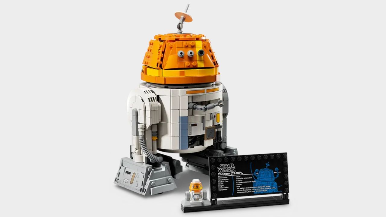 Lego Chopper figure on a plain background, beside a plaque