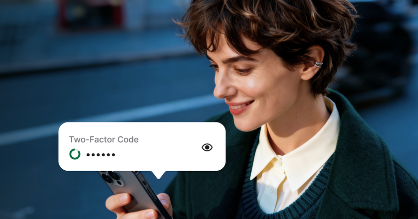 An image depicting a smiling woman using two-factor authentication to seamlessly login in a secure account.