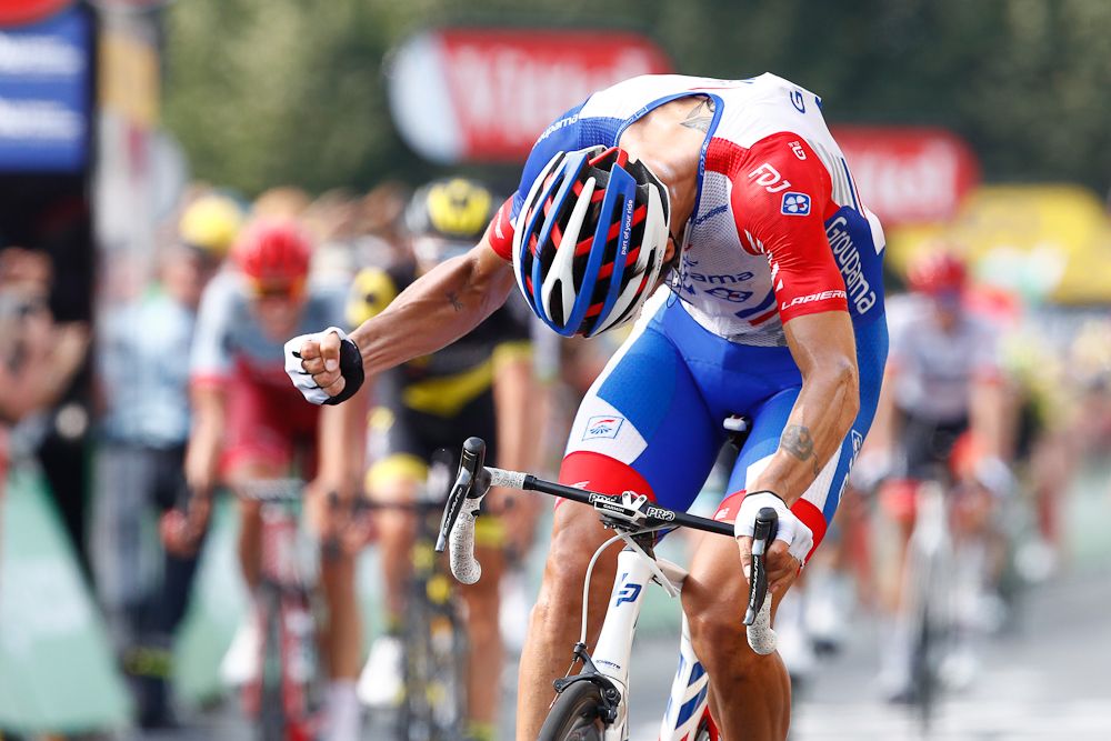 Arnaud Demare celebrates after winning stage 18 at the Tour de France
