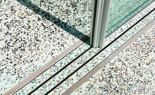 Poured small strips of the terrazzo between sliding door tracks.