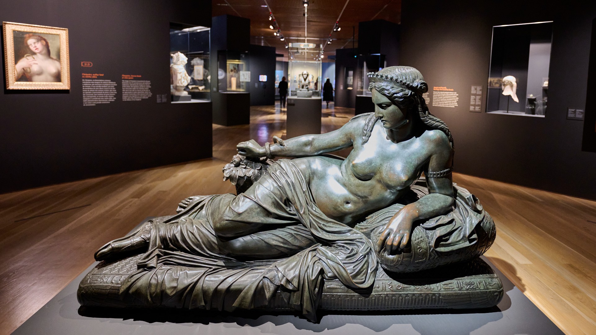 Cleopatra's statue with Asp snake seen on display during a press visit to "Pharaohs Superstars" in Gulbenkian Foundation on November 24, 2022, in Lisbon, Portugal. Here we see a nude woman, with a sheet wrapped around her legs and an Asp snaking up her arm.