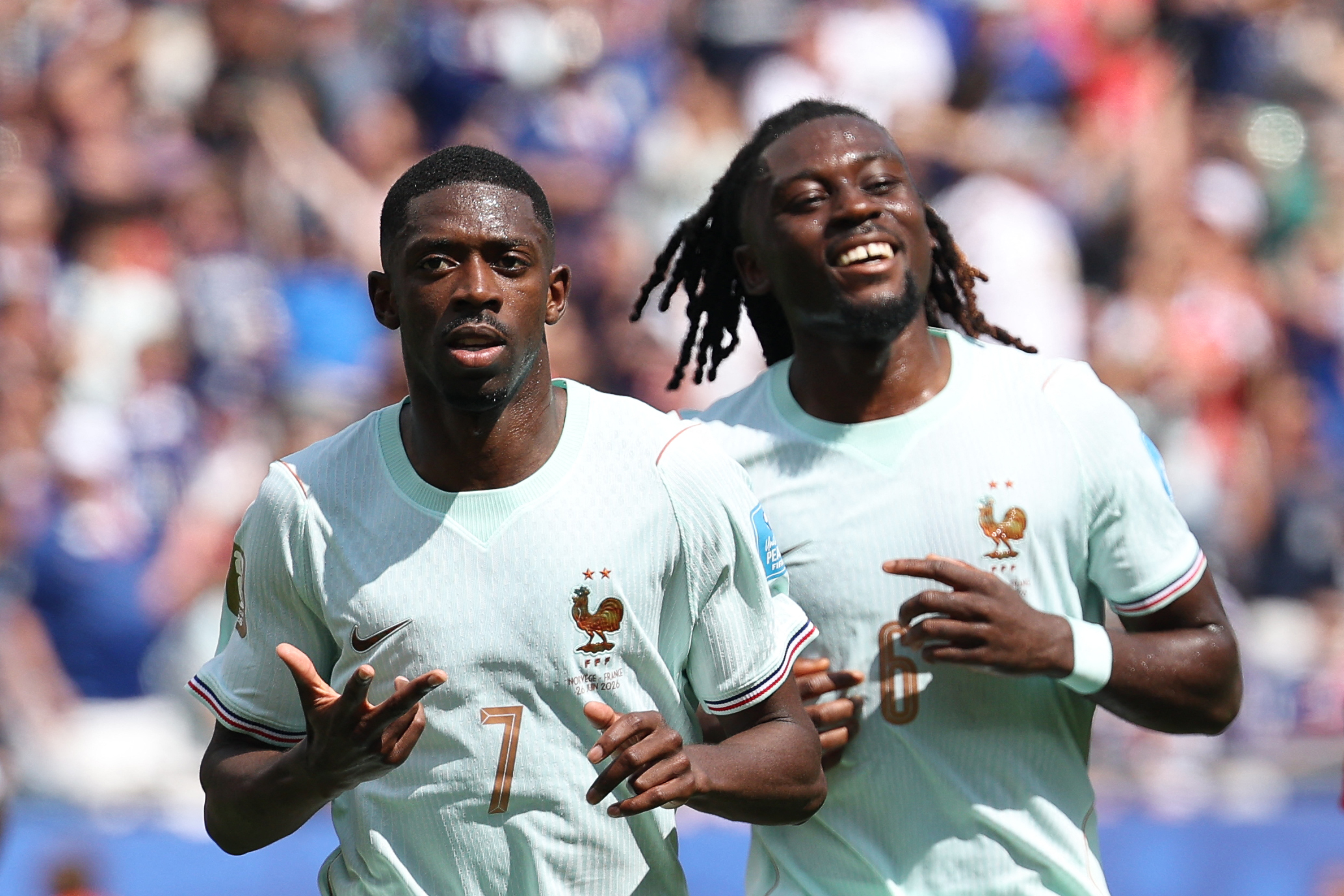 France's forward #07 Ousmane Dembele celebrates scoring his team's third goal with midfielder #06 Manu Kone during the 2026 World Cup Group I football match between Norway and France at the Boston Stadium in Foxborough on June 26, 2026. (Photo by FRANCK FIFE / AFP)