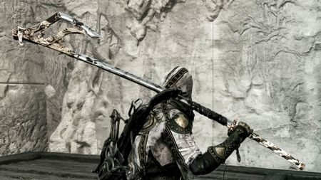 Tiel holds the Mortal Shell 2 Axatana over his shoulder.