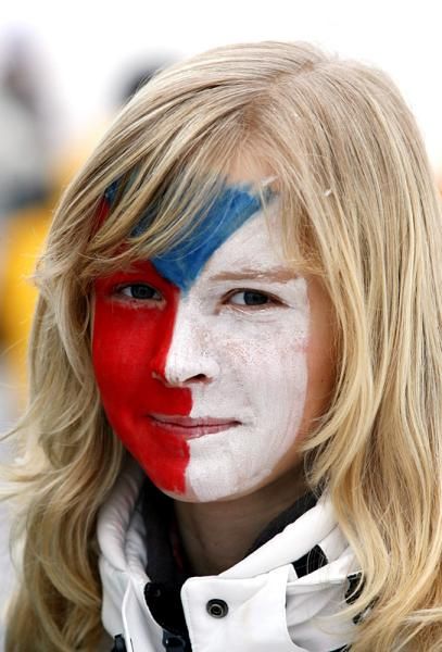 A fan with the Czech national colors.