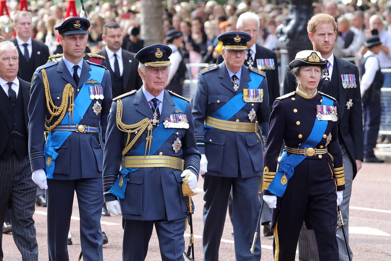 Prince William, Prince of Wales, King Charles III, Prince Richard, Duke of Gloucester, Princess Anne, Princess Royal and Prince Harry, Duke of Sussex walk behind the coffin during the procession for the Lying-in State of Queen Elizabeth II