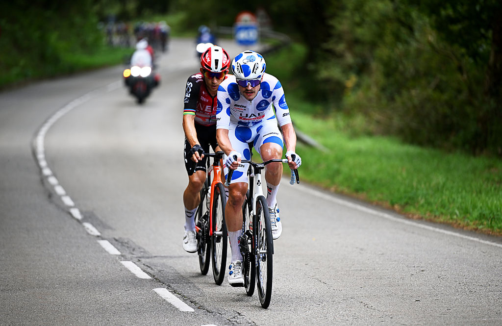 MONFORTE DE LEMOS, SPAIN - SEPTEMBER 07: (L-R) Michal Kwiatkowski of Poland and Team INEOS Grenadiers and Jay Vine of Australia and UAE Team Emirates - XRG - Polka dot Mountain compete in the breakaway during the La Vuelta - 80th Tour of Spain 2025, Stage 15 a 167.8km stage from A Veiga-Vegadeo to Monforte de Lemos / #UCIWT / on September 07, 2025 in Monforte de Lemos, Spain. (Photo by Dario Belingheri/Getty Images)