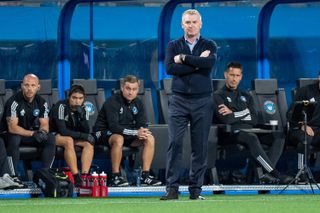 Dean Smith looks on during a game between Charlotte FC and Toronto FC in April 2024.