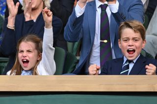 Prince Charlotte and Prince George cheering