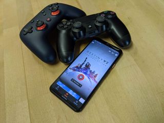 Stadia and PS4 controllers hero