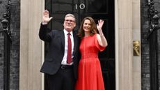 Keir Starmer and wife Victoria greet supporters as they enter 10 Downing Street 